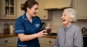 Joyful home care moment in the kitchen